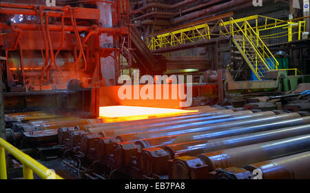 hot steel sheet on conveyor; sheet metal Stock Photo