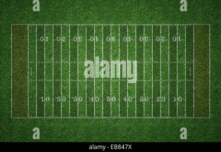 Green grass American football field with white lines marking the pitch. Stock Photo