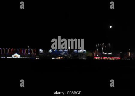 Night Beach view Star Attraction, Sea Life Centre, full moon over Funland Amusements, Central Promenade, Blackpool Illuminations Stock Photo