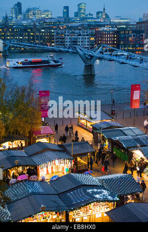 Tate Modern, London, UK. 27th November 2014. Christmas Market stands outside the Tate Modern Gallery opposite St Pauls Cathedral. Credit:  Matthew Chattle/Alamy Live News Stock Photo