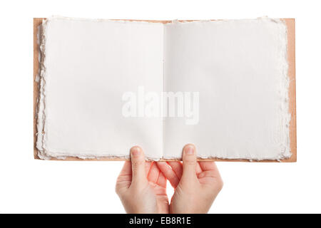 Opened book in hands isolated on white background Stock Photo