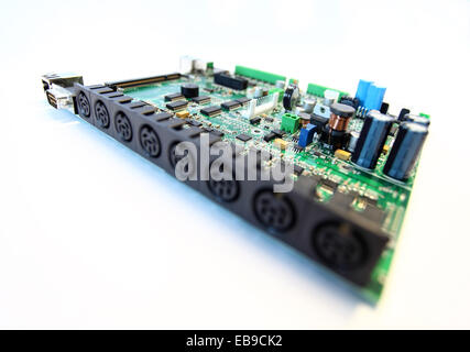 electronic circuit board close up on a white background Stock Photo