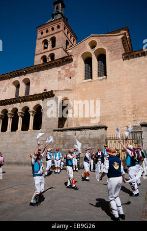 SEGOVIA  SPAIN - MARCH 16 2014 - East Suffolk Morris Men dancing in the ancient Roman city of Segovia, Spain with blue and white Stock Photo