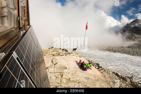 Solar panels on the Cabanne D' Orny in the Swiss Alps, providing electricty for this off grid mountain hut at over 10,000 feet. Stock Photo