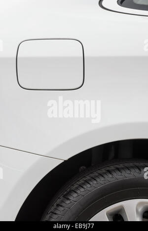 tyre and petrol cap cover and window of a white car Stock Photo