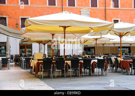 Tables outdoor restaurant on the Piazza della Signoria in Verona, Italy Stock Photo