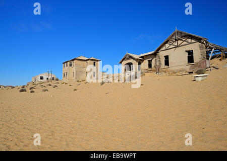 Abandoned houses in the desert, former diamond mining town, now a ghost town, Kolmanskop, Lüderitz, Karas Region, Namibia Stock Photo
