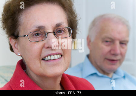 Older couple at home smiling, Stock Photo