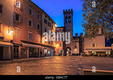 Riva del Garda town by night, Italy Stock Photo