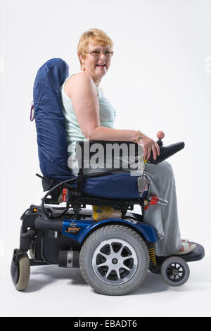 smiling disabled woman in wheelchair with laptop Stock Photo - Alamy