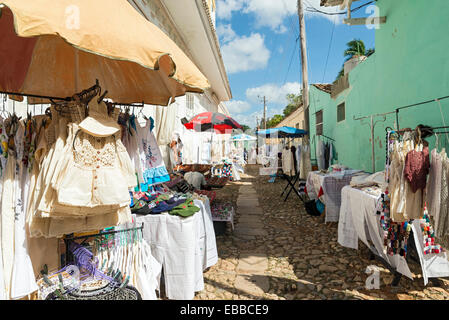 TRINIDAD, CUBA, MAY 8, 2014. Clothes and souvenirs for sale in the street in Trinidad, Cuba, on May 8th, 2014. Stock Photo