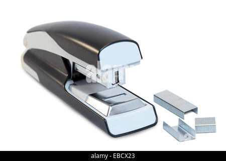 Closeup of a grey office stapler and staples, isolated on white background Stock Photo