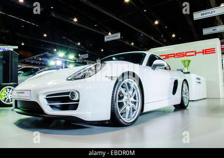 Nonthaburi, Thailand. 28th November, 2014.   Porsche Cayman car on display at Thailand International Motor Expo 2014 on November 28, 2014 in Nonthaburi, Thailand. Credit:  Chatchai Somwat/Alamy Live News Stock Photo