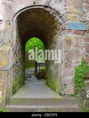 Passage through the old City Wall with the name Schnatterloch on sign, Miltenberg, Spessart, Franconia, Bavaria, Germany Stock Photo