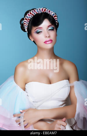 Inspiration. Fashion Model with Dramatic Theatrical Makeup and Diadem Stock Photo