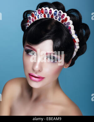 Glamor. Beautiful Brunette in Crown with Jewels Stock Photo