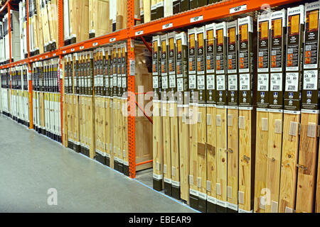A row of many wooden doors for sale at Home Depot in College Point, Queens, New York City Stock Photo