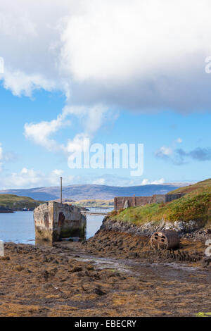 The Cretetree is a concrete barge beached in the harbour of the Isle of Scalpay, near Tarbert, Harris Scotland. She was built by the Aberdeen Concrete Ships Company in 1919. It is currently used for storage by local fishermen. Stock Photo
