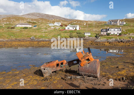 Rusty boiler on the shoreline in Isle of Scalpay, near Harris, Scotland. Stock Photo