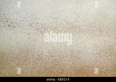 Sprinkled old yellow paper as background Stock Photo