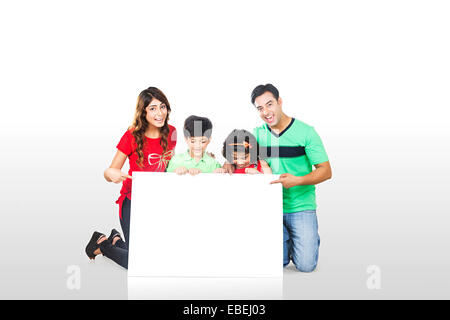 indian Family Showing Message Board Stock Photo