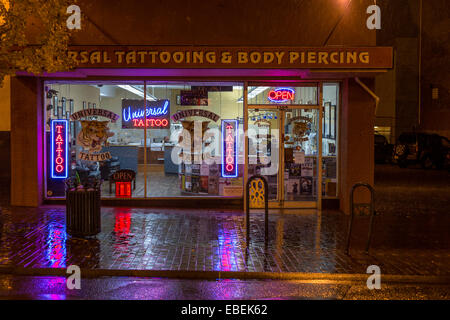 Tattoo parlor in downtown Victoria at night-Victoria, British Columbia, Canada. Stock Photo