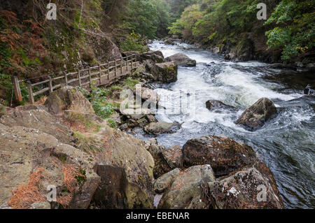 The Afon (river) Glaslyn as it passes through the Aberglaslyn Pass near Beddgelert in Snowdonia, North Wales. Stock Photo