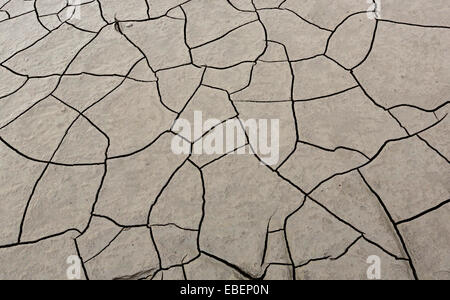 Cracks in drying mud on bank of River Severn, England, UK Stock Photo