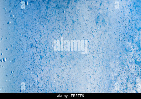 blue winter background frost on window Stock Photo