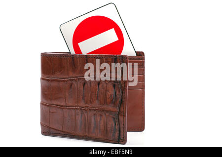 crocodile leather wallet and red stop sign on a white background Stock Photo