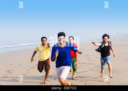 indian friends beach Running Stock Photo