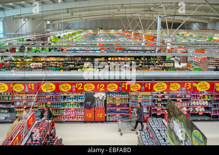 High angle from above view of aisles and customers at an Asda Supermarket, Scotland, UK  Model Release: No.  Property Release: No. Stock Photo