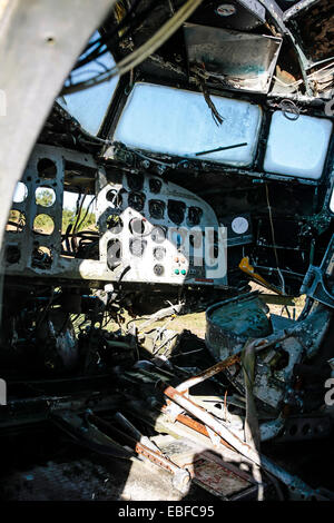 Inside a derelict cockpit of a Douglas DC-3 at an aviation junkyard in Florida Stock Photo