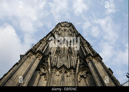 looking up one of the towers of Cologne Cathedral in Cologne, NRW, Deutschland Stock Photo