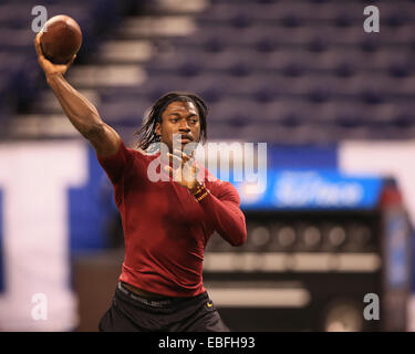 Indianapolis, IN, USA. 30th Nov, 2014. Washington Redskins quarterback Robert Griffin III warms up prior to the start of the NFL game between the Washington Redskins and the Indianapolis Colts at Lucas Oil Field in Indianapolis, Indiana. ©2014 Billy Hurst/CSM/Alamy Live News Stock Photo