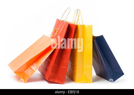 Several color paper bags on white background. Stock Photo
