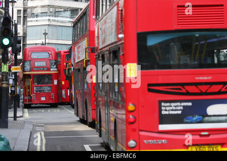 A row of red London buses in London's Oxford Street Stock Photo
