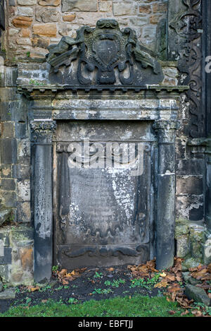 Alexander Bethune's Monument who died on 9th November 1672, a later memorial to Doctor Spens is incorporated in the stonework. Stock Photo