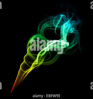 Abstract bright multicolored smoke on a dark background. Stock Photo
