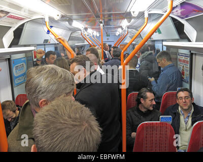 Overcrowded South West Train bound for London Waterloo railway station, England, UK Stock Photo