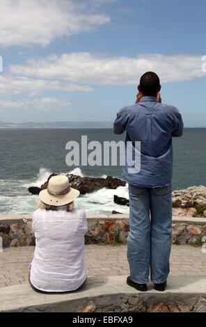 Whale Watchers at Hermanus in the Western Cape of South Africa Stock Photo