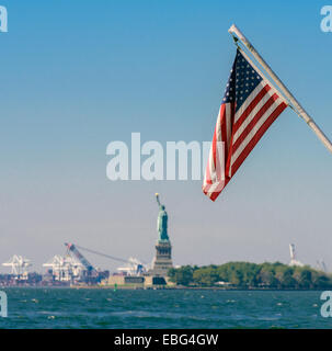 Statue of Liberty and the American Flag Stock Photo