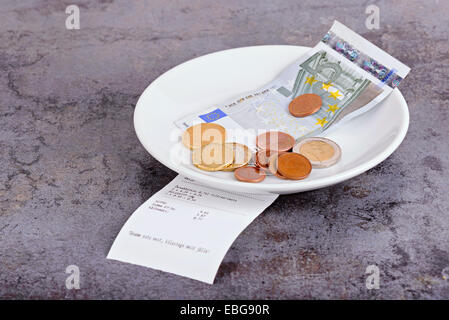 Tip on a restaurant table Stock Photo