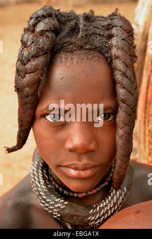 Himba girl with typical hairstyle, Omuramba, Kaokoland, Kunene Stock ...