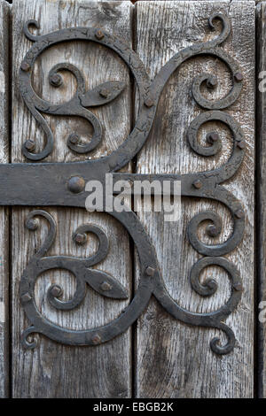 Hand-forged iron works on a wooden door, Isny im Allgäu, Allgäu, Upper Swabia, Baden-Württemberg, Germany Stock Photo