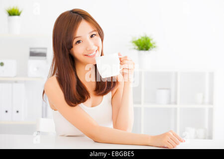 happy asian young drinking coffee Stock Photo