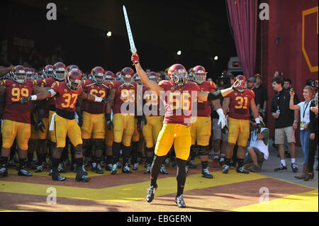 Los Angeles, CA, USA. 29th Nov, 2014. USC Trojans offensive tackle Jordan Austin #56 leads out the Trojans onto the field before the NCAA Football game between the Notre Dame Fighting Irish and the USC Trojans at the Coliseum in Los Angeles, California. © csm/Alamy Live News Stock Photo