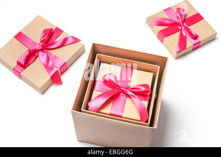 Three gift boxes packed into one another isolated on white Stock Photo