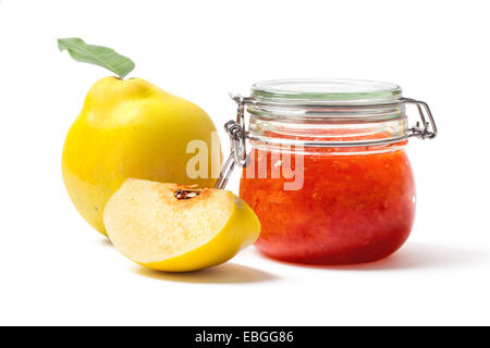 Ripe quinces and jar with quince jam isolated on white background. Stock Photo