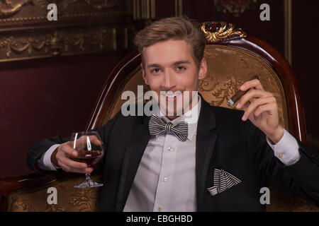 Handsome man with cigar Stock Photo